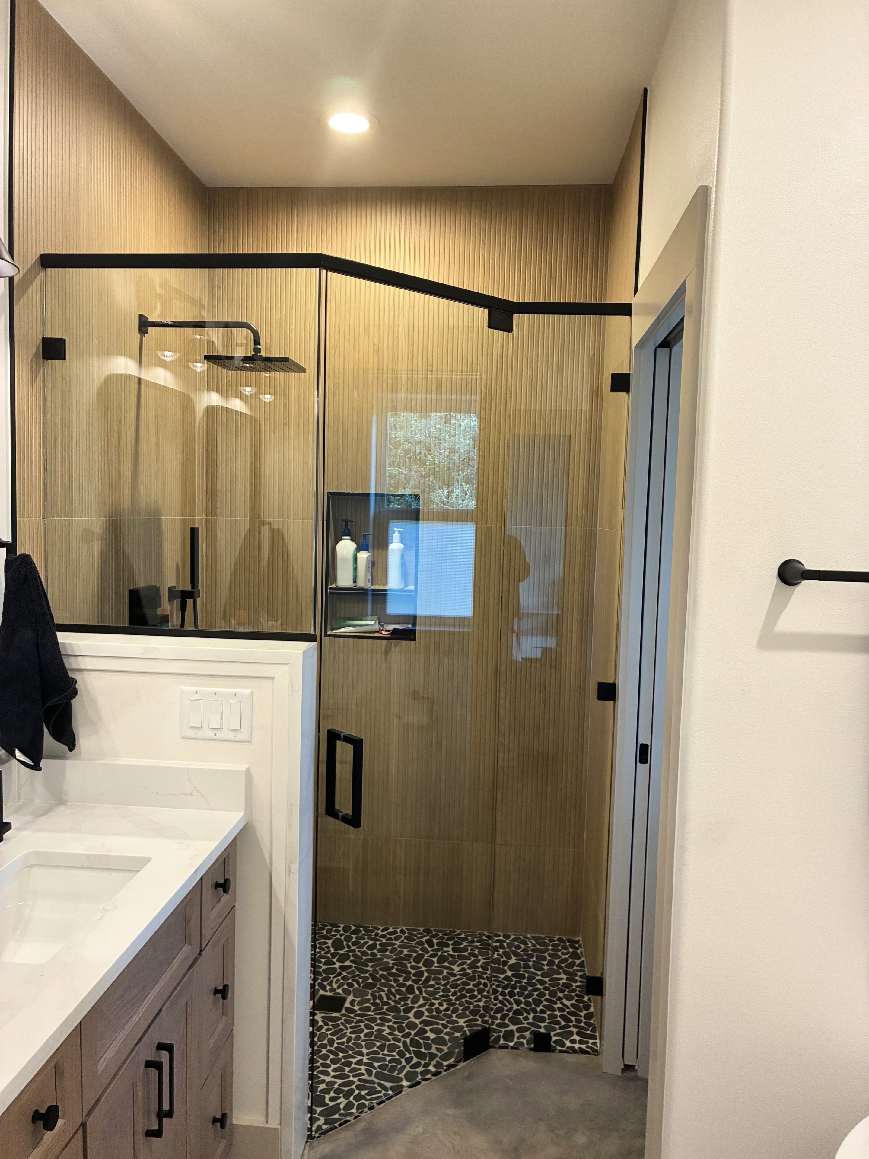 Frameless glass shower door installation
